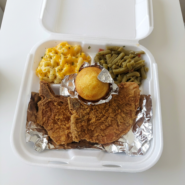 2 Pc Fried Pork Chops 2 Sides.